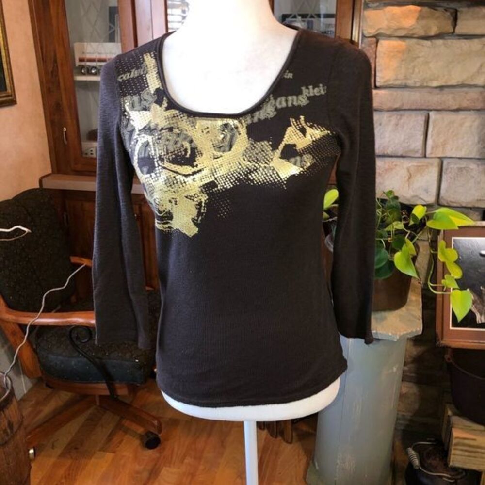 Calvin Klein size small brown 3/4 sleeve distressing on hem and cuffs